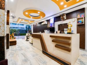 a lobby of a restaurant with a counter at Hotel NDH 47 in Korādih