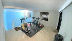 a room with some exercise equipment in a room at The Yafé Bastos 9 in Yaoundé