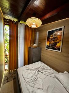 a bedroom with a large bed in a room at Eagle Park&Camping in Bajkaj