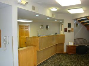 a waiting room with a large mirror in a hospital at Wilmington Inn in Wilmington