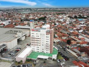 an overhead view of a city with a white building at ibis Feira de Santana in Feira de Santana