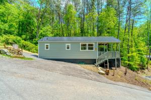 a tiny house on the side of a road at Serenity at the Smokies in Sevierville +14 photos