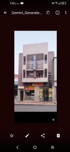 a screenshot of a building with a picture of it at Hotel Surandino Fátima in Pasto