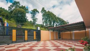 a view of a building with a balcony at The Blooming Tulip in Shergaon +7 photos