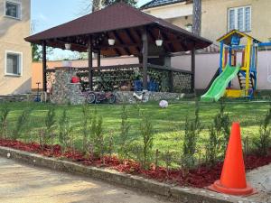 a playground with a slide at Bukuljska svežina 1 in Arandelovac