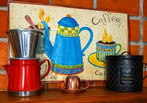 a painting of a tea kettle and cups on a table at Bosque da Lua - Suite with 2 bathrooms - Up to 5 guests in Itupeva