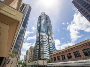 a tall building in the middle of a city at Executive Center 1604 in Honolulu