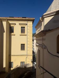 a view of a building next to another building at Scaramella room s in Salerno