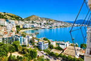 a view of a city and a body of water at Panorama Sky Apartment in Sarandë