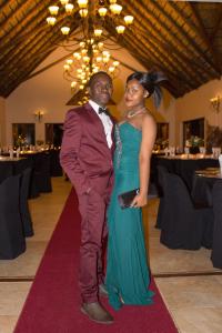 a man and a woman standing on a red carpet at Lapeng Guest Lodge in Burgersfort