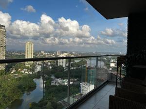 a view of a river from a balcony of a building at Iconic Galaxy in Rajagiriya