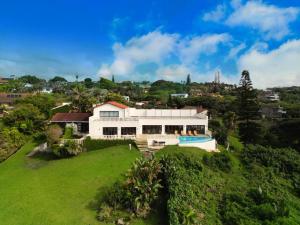an aerial view of a house on a hill at Gracelands Beach Lodge in Ramsgate