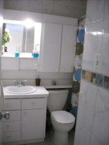 A bathroom at Ocean Front Apartment