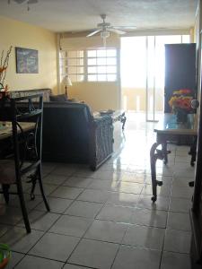 A seating area at Ocean Front Apartment