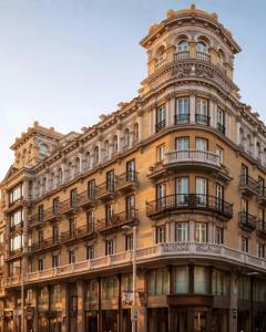 an ornate building with a round at Nômade Temple Madrid in Madrid