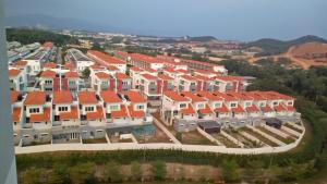 a group of houses with orange roofs at DKajang Villa Homestay Kajang in Kajang