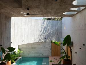 a swimming pool in a house with a ceiling at Design-Forward 2BR Villa with Private Pool NEW in Brisas de Zicatela