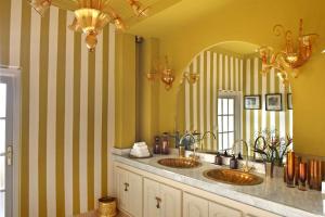 a bathroom with two sinks and a large mirror at Villa Samadhi - Luxury & Serenity in Marrakesh +100 photos