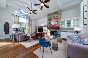 a living room with a couch and a fireplace at 2251 Catesby's Bluff in Seabrook Island