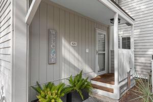a front porch of a house with a sign on it at 620 Shadowwood in Seabrook Island