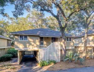 a house with a tree in front of it at 1129 Summerwind Cottage in Seabrook Island