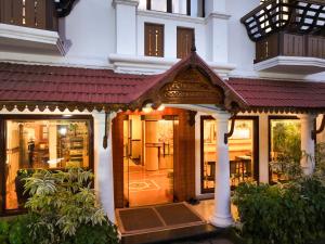 a house with a red roof at Padipura Residency in Alleppey