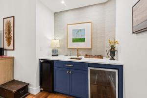a bathroom with a blue cabinet and a sink at 2565 The Haul Over in Seabrook Island