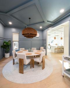 a dining room with a table and chairs at 3151 Baywood Drive in Seabrook Island