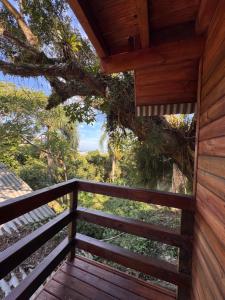 a view from the deck of a tree house at Cabanas da zimba in Imbituba