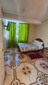 Llit o llits en una habitació de Puri