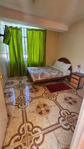 Llit o llits en una habitació de Puri
