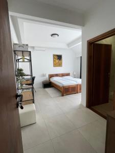 a bedroom with a bed and a ladder in a room at Noce Rooms Zagreb in Zagreb