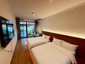 Katil atau katil-katil dalam bilik di pine house