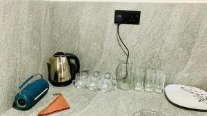 a group of glasses sitting on a table at Mayon villa in Midigama East