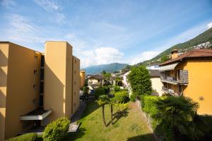 a view from the apartment building at Minusio, Casa Gottardo - nahe Zentrum Locarno und See Lago Maggiore, mit Balkon und Parkplatz in Minusio