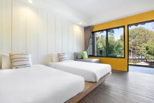 Postel nebo postele na pokoji v ubytování Samed Hideaway Resort + 33 fotografií