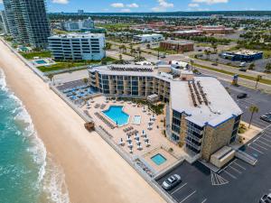 an overhead view of a hotel and the beach at Ocean East Resort Club in Ormond Beach