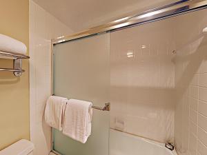 a bathroom with a glass shower door with towels at Timberline Condominiums 3 Bedroom Standard Unit D2A in Snowmass Village +20 photos