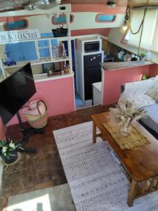 a living room with a couch and a table at party like a local in Key West