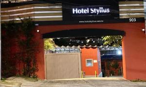 a hotel rhythms sign on the front of a building at Hotel Styllus in São Paulo