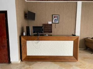 a desk with a white screen in a room at SINGAPOUR MAROC in Casablanca