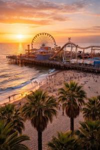 a beach with a pier and a ferris wheel at Central Penthouse Studio with Free Parking in Los Angeles