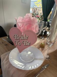 a plate with a heart on a plate with a bride to be sign at Villa Roztocze in Pary +36 photos