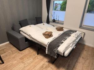 Llit o llits en una habitació de Ferienwohnungen Dedeleben