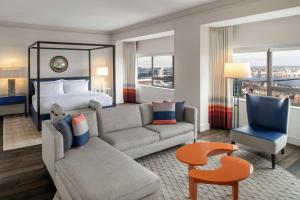 a living room with a couch and a bed at The Westin Copley Place, Boston in Boston +97 photos
