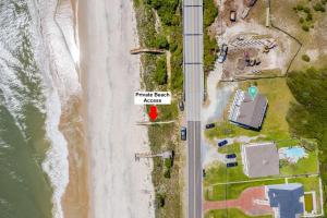 an overhead view of a beach next to the ocean at Oceanfront with Private Beach Access Sunset Views in Sneads Ferry