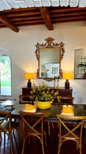 a room with a table with a yellow bowl on it at Riant Relais de Charme in Greve in Chianti