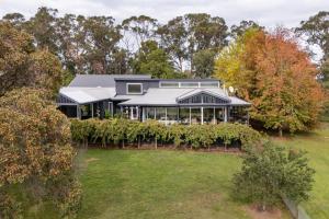 an aerial view of a house with a garden at Mysa Homestead in Tonimbuc