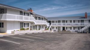 a parking lot in front of a building at Stargazer Hotel in Monterey
