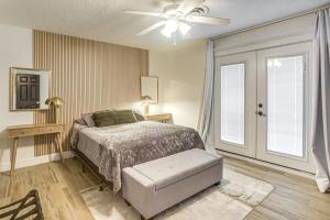 a bedroom with a bed and a ceiling fan at Centrally Located Eagle Pass Home w/ Pool! in Eagle Pass +20 photos